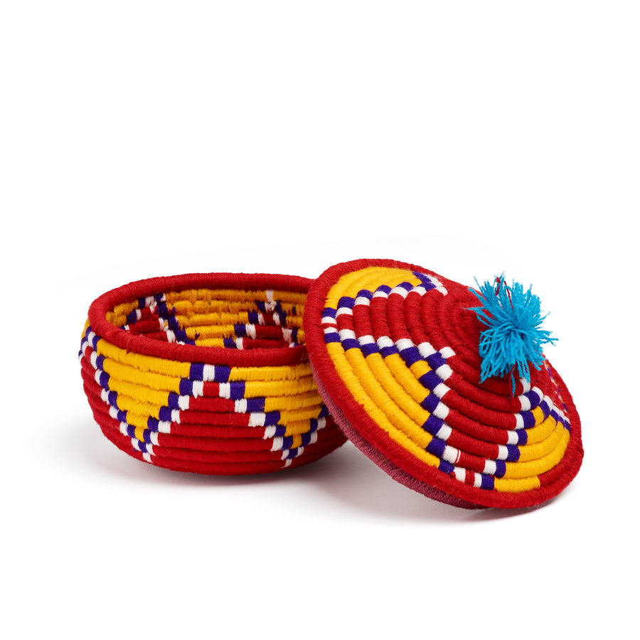 red and yellow valede round basket